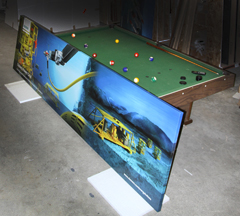 A finished gallery wrapped canvas, with pool table for size reference