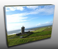 A beautiful view of the sea and an old castle in Ireland